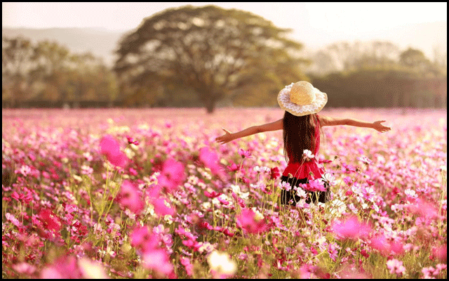 Persephone in a field of flowers